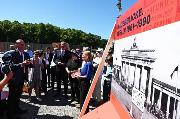 65th Anniversary of the Berlin Wall in Berlin BERLIN, GERMANY – AUGUST 12: Berlin’s Governing Mayor Kai Wegner and Federal Commissioner for Culture and the Media Wolfram Weimer attend the opening ceremony of a 30-meter-long temporary memorial installation and the open-air exhibition Views of the Wall: Berlin 1961–1990, marking the 65th anniversary of the construction of the Berlin Wall, near the Brandenburg Gate in Berlin, Germany, on August 12, 2026. Volodymyr Sindieiev Anadolu Berlin Germany. Editorial use only. Please get in touch for any other usage.  Copyright: x2026xAnadoluxVolodymyrxSindieievx
