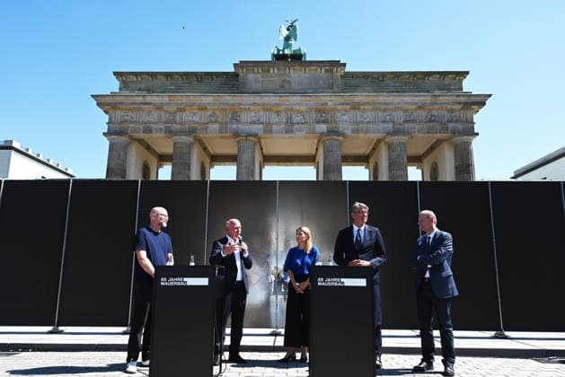 65th Anniversary of the Berlin Wall in Berlin BERLIN, GERMANY – AUGUST 12: Berlin’s Governing Mayor Kai Wegner and Federal Commissioner for Culture and the Media Wolfram Weimer attend the opening ceremony of a 30-meter-long temporary memorial installation and the open-air exhibition Views of the Wall: Berlin 1961–1990, marking the 65th anniversary of the construction of the Berlin Wall, near the Brandenburg Gate in Berlin, Germany, on August 12, 2026. Volodymyr Sindieiev Anadolu Berlin Germany. Editorial use only. Please get in touch for any other usage.  Copyright: x2026xAnadoluxVolodymyrxSindieievx