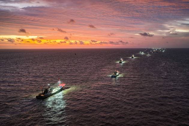 (260812) -- LIANYUNGANG, Aug. 12, 2026 -- An aerial drone photo taken on Aug. 12, 2026 shows fishing boats departing for the Yellow Sea after a fishing ban was lifted in Lianyungang City, east China s Jiangsu Province. Special licensed fishing vessels set out to the Yellow Sea as the summer fishing moratorium was partially lifted on Aug. 12, which had been postponed for a week due to impacts of Typhoon Dolpin. (Photo by Xinhua) CHINA-JIANGSU-YELLOW SEA-FISHING BAN-LIFTING (CN) SixWei 