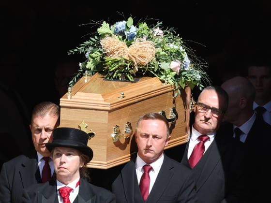 . 12 08 2026. Buckfast, United Kingdom. The coffin of Ann Widdecombe leaving Buckfast Abbey after her funeral in Buckfast, United Kingdom.  xStephenxLockx xi-Imagesx IIM-26942-0007