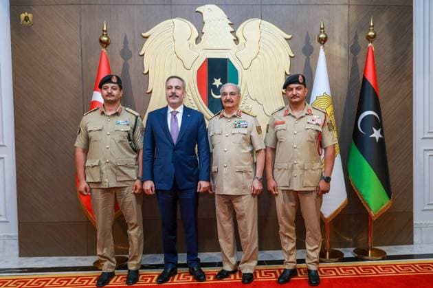 Turkish Foreign Minister Hakan Fidan in Tripoli BENGHAZI, LIBYA - AUGUST 12: (----EDITORIAL USE ONLY MANDATORY CREDIT - TURKISH FOREIGN MINISTRY HANDOUT - NO MARKETING NO ADVERTISING CAMPAIGNS - DISTRIBUTED AS A SERVICE TO CLIENTS----) Turkish Foreign Minister Hakan Fidan (L) meets with Commander of the Eastern Libyan Forces, Khalifa Haftar (2nd R) and Gen. Saddam Haftar, (R) deputy commander of the Libyan National Army during his visit in Benghazi, Libya, on August 12, 2026. Turkish Foreign Ministry Handout Anadolu Benghazi Libya. Editorial use only. Please get in touch for any other usage.  Copyright: x2026xAnadoluxTurkishxForeignxMinistryx xHandoutx