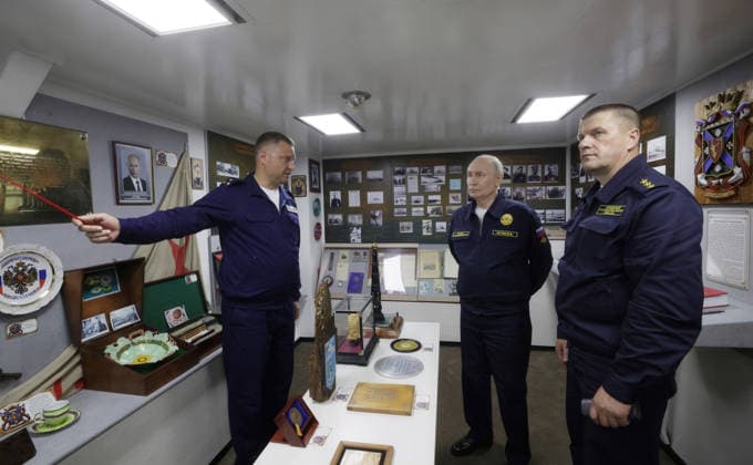 August 12, 2026, Korsakov, Sakhalin Oblast, Russia: Russian President Vladimir Putin, center, alongside Pacific Fleet Commander-in-Chief Admiral Viktor Liina, right, is given a tour of the Russian Navy Slava-class missile cruiser RF Varyag, August 12, 2026 in Korsakov, Sakhalin Oblast, Russia. Putin is visiting the remote island in the Russian Far East to view the Pacific Fleet naval exercises. Korsakov Russia - ZUMAp138 20260812_zaa_p138_002 Copyright: xGavriilxGrigorov RussianxGovernmx