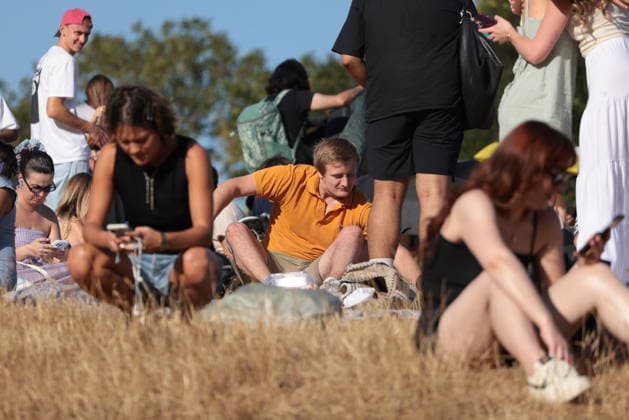 . 12 08 2026. London, United Kingdom. Partial Solar Eclipse. People gather on Primrose Hill in London to observe a Partial Solar Eclipse.  xMartynxWheatleyx xi-Imagesx IIM-26943-0003