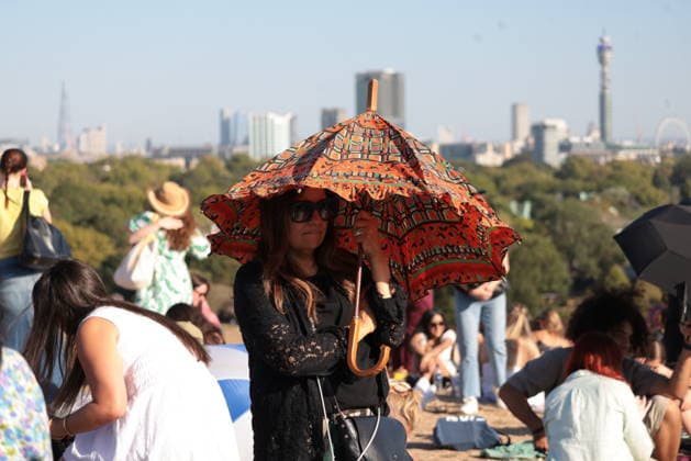 . 12 08 2026. London, United Kingdom. Partial Solar Eclipse. People gather on Primrose Hill in London to observe a Partial Solar Eclipse.  xMartynxWheatleyx xi-Imagesx IIM-26943-0010