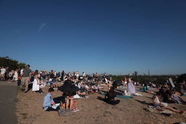 . 12 08 2026. London, United Kingdom. Partial Solar Eclipse. People gather on Primrose Hill in London to observe a Partial Solar Eclipse.  xMartynxWheatleyx xi-Imagesx IIM-26943-0014