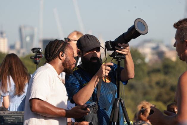 . 12 08 2026. London, United Kingdom. Partial Solar Eclipse. People gather on Primrose Hill in London to observe a Partial Solar Eclipse.  xMartynxWheatleyx xi-Imagesx IIM-26943-0018