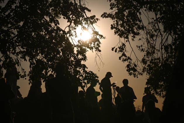 Hundreds Gather At Krakow s Historic Krakus Mound To Watch Solar Eclipse KRAKOW, POLAND - AUGUST 12: People gather on top of the Krakus Mound (Kopiec Krakusa) to watch a solar eclipse on August 12, 2026 in Krakow, Poland. Hundreds of residents and tourists ascended the historic prehistoric mound, which offers panoramic views of the city, equipped with protective eyewear and telescopes to witness the rare celestial event. Krakow Poland  Copyright: xArturxWidakx originalFilename: widak-hundreds260812_npy6E.jpg