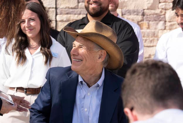 August 12, 2026, San Marcos, Tx, United States: Texas Governor GREG ABBOTT dons a cowboy hat as he speaks during the opening of another 76,000 square foot Buc-ee s convenience store in San Marcos, Texas on August 12, 2026. The store features beaver-themed merchandise, lots of food choices and 124 gas pumps. San Marcos United States - ZUMAd150 20260812_znp_d150_003 Copyright: xBobxDaemmrichx