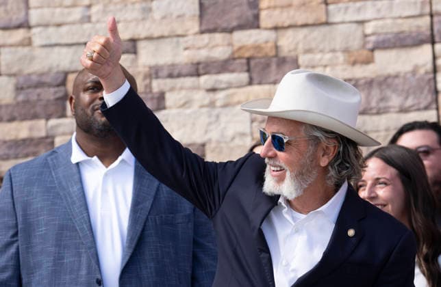 August 12, 2026, San Marcos, Tx, United States: Buc-ee s founder ARCH BEAVER APLIN greets customes in the 74,000 foot Buc-ee s convenience store in San Marcos, Texas after Gov. Greg Abbott (not shown) spoke to the crowd during the opening of Buc-ee s convenience store in San Marcos, Texas on August 12, 2026. The store features beaver-themed merchandise, lots of food choices and 124 gas pumps. San Marcos United States  - ZUMAd150 20260812_znp_d150_004 Copyright: xBobxDaemmrichx