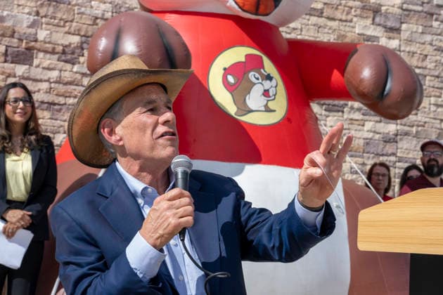 August 12, 2026, San Marcos, Tx, United States: Texas Governor GREG ABBOTT dons a cowboy hat as he speaks during the opening of another 76,000 square foot Buc-ee s convenience store in San Marcos, Texas on August 12, 2026. The store features beaver-themed merchandise, lots of food choices and 124 gas pumps. San Marcos United States  - ZUMAd150 20260812_znp_d150_011 Copyright: xBobxDaemmrichx