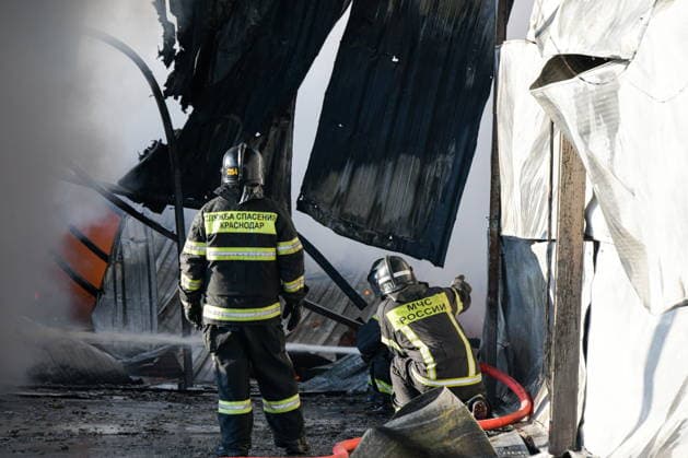 RUSSIA, KRASNODAR REGION - AUGUST 12, 2026: Employees of the Russian Emergencies Minsitry respond to a fire at a warehouse storing plastic products in the village of Lenina, southeast of Krasnodar. The fire covering an area of 2.2 thousand sq m has been contained. Roman Sokolov TASS  96070279