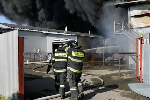 RUSSIA, KRASNODAR REGION - AUGUST 12, 2026: Employees of the Russian Emergencies Minsitry respond to a fire at a warehouse storing plastic products in the village of Lenina, southeast of Krasnodar. The fire covering an area of 2.2 thousand sq m has been contained. Roman Sokolov TASS  96069810