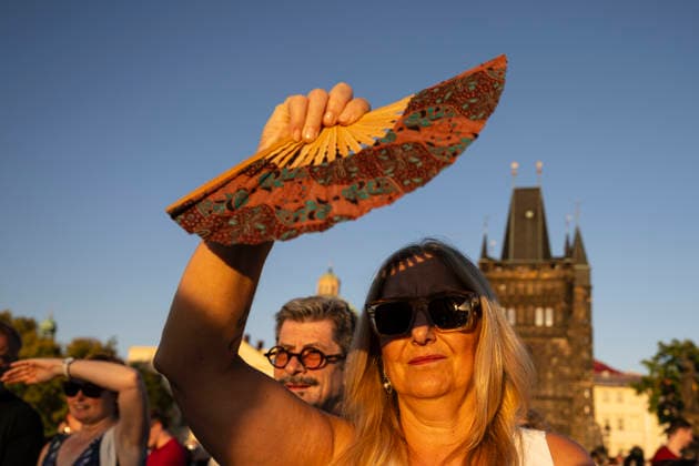 People observe partial solar eclipse in Prague, Czech Republic, August 12, 2026. (CTKxPhoto MichalxKamaryt) CTKPhotoP2026081206819  CTKPhotoP2026081206819