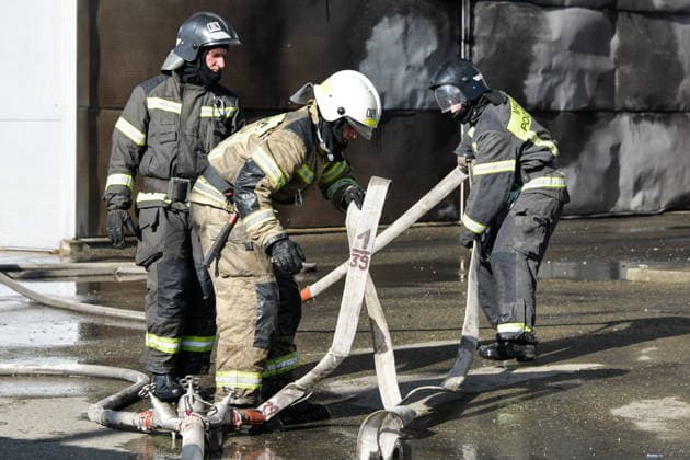RUSSIA, KRASNODAR REGION - AUGUST 12, 2026: Employees of the Russian Emergencies Minsitry respond to a fire at a warehouse storing plastic products in the village of Lenina, southeast of Krasnodar. The fire covering an area of 2.2 thousand sq m has been contained Russia  - ZUMAt113 20260812_zaa_t113_348 Copyright: xRomanxSokolovx