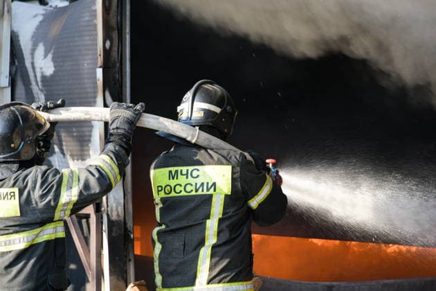 RUSSIA, KRASNODAR REGION - AUGUST 12, 2026: Employees of the Russian Emergencies Minsitry respond to a fire at a warehouse storing plastic products in the village of Lenina, southeast of Krasnodar. The fire covering an area of 2.2 thousand sq m has been contained Russia  - ZUMAt113 20260812_zaa_t113_357 Copyright: xRomanxSokolovx