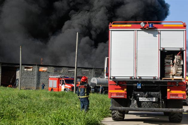 RUSSIA, KRASNODAR REGION - AUGUST 12, 2026: Smoke billows over a warehouse storing plastic products, hit by fire in the village of Lenina, southeast of Krasnodar. The fire covering an area of 2.2 thousand sq m has been contained. Roman Sokolov TASS  96070030