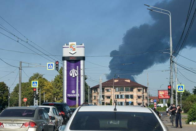 RUSSIA, KRASNODAR REGION - AUGUST 12, 2026: Smoke billows over a warehouse storing plastic products, hit by fire in the village of Lenina, southeast of Krasnodar. The fire covering an area of 2.2 thousand sq m has been contained Russia  - ZUMAt113 20260812_zaa_t113_370 Copyright: xRomanxSokolovx