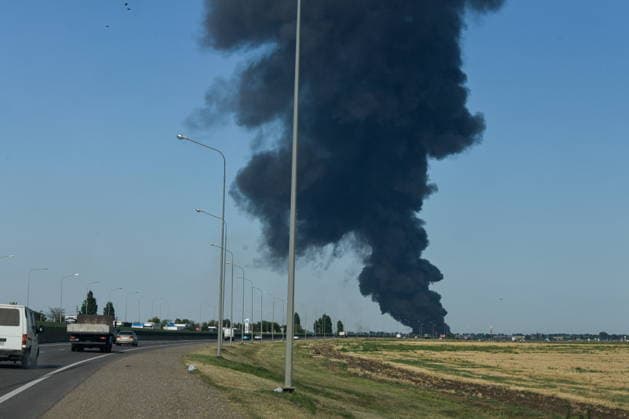 RUSSIA, KRASNODAR REGION - AUGUST 12, 2026: Smoke billows over a warehouse storing plastic products, hit by fire in the village of Lenina, southeast of Krasnodar. The fire covering an area of 2.2 thousand sq m has been contained Russia  - ZUMAt113 20260812_zaa_t113_372 Copyright: xRomanxSokolovx