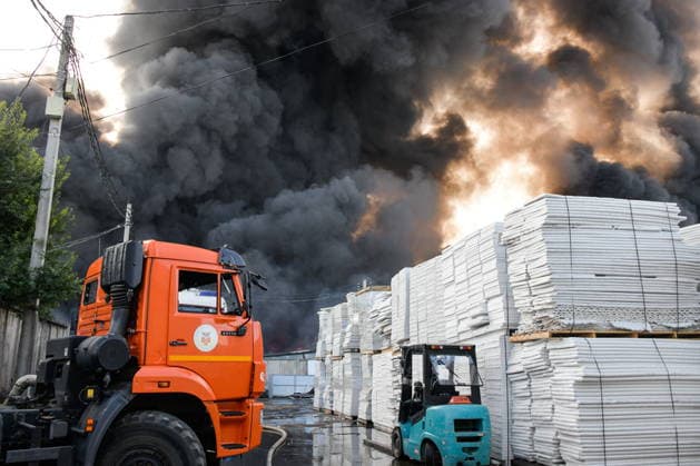 RUSSIA, KRASNODAR REGION - AUGUST 12, 2026: Smoke billows over a warehouse storing plastic products, hit by fire in the village of Lenina, southeast of Krasnodar. The fire covering an area of 2.2 thousand sq m has been contained Russia  - ZUMAt113 20260812_zaa_t113_382 Copyright: xRomanxSokolovx
