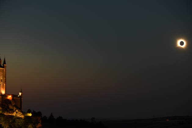 August 12, 2026, Segovia, Castilla Y LeoÂ³N, Spain: A total solar eclipse is seen over the AlcoÂ¡zar of Segovia with the Alcazar on view, Spain, on August 12, 2026, as the Moon passes directly between the Earth and the Sun, briefly blocking the Sun s disk. The eclipse is visible across parts of Spain, with Segovia experiencing totality. Segovia Spain - ZUMAc317 20260812_zip_c317_005 Copyright: xAdelinaxCobosx