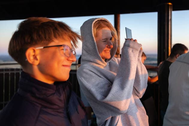 People observe partial solar eclipse in Pritluky, Czech Republic, August 12, 2026. (CTKxPhoto RichardxSkoumal) CTKPhotoP2026081207117  CTKPhotoP2026081207117