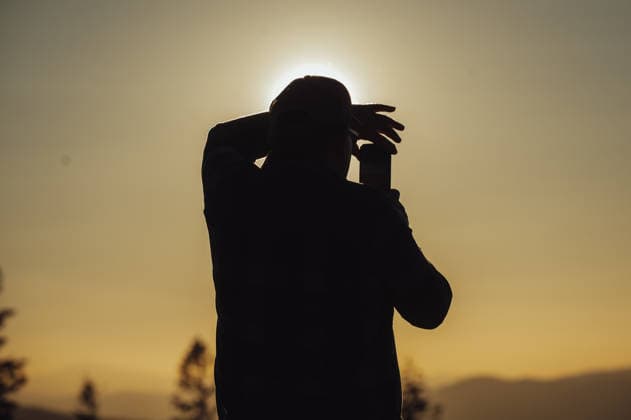 Solar eclipse viewed from Slovakia KOJSOV, SLOVAKIA - AUGUST 12: A man takes photographs of the Sun during a total eclipse of the sun on August 12, 2026 near Kojsov, Slovakia. Millions of people have flocked to areas where the eclipse was visible. During the event, the moon passed in between the Sun and the Earth, appearing to partially block the sun. Robert Nemeti Anadolu Kojsov Slovakia. Editorial use only. Please get in touch for any other usage.  Copyright: x2026xAnadoluxRobertxNemetix