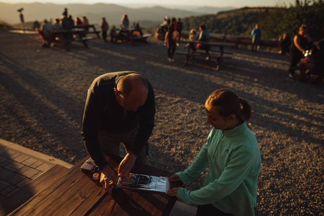 Solar eclipse viewed from Slovakia KOJSOV, SLOVAKIA - AUGUST 12: A father and his daughter prepare DIY-made solar filters to view the Sun during a total eclipse of the sun on August 12, 2026 near Kojsov, Slovakia. Millions of people have flocked to areas where the eclipse was visible. During the event, the moon passed in between the Sun and the Earth, appearing to partially block the sun. Robert Nemeti Anadolu Kojsov Slovakia. Editorial use only. Please get in touch for any other usage.  Copyright: x2026xAnadoluxRobertxNemetix