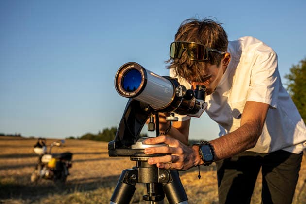 People observe partial solar eclipse in Dalesice, Czech Republic, August 12, 2026. (CTKxPhoto RadekxPetrasek) CTKPhotoP2026081207465  CTKPhotoP2026081207465