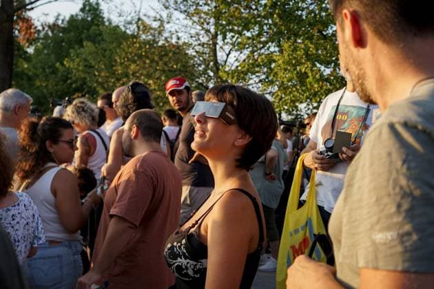 August 12, 2026, Torino, Italy: TURIN, ITALY Ã¢â‚¬ AUGUST 12, 2026: Hundreds of people gather in front of the Basilica of Superga, one of Turin s highest viewpoints, to observe a partial solar eclipse at sunset on August 12, 2026. Spectators used eclipse glasses and other viewing devices as the Moon obscured most of the solar disc, with the phenomenon reaching its maximum visible phase in the Turin area at around 8:30 p.m. Torino Italy - ZUMAq101 20260812_zna_q101_240 Copyright: xChiaraxAntenuccix