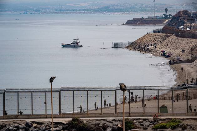 Morocco reinforces border security as migrants continue to leave Ceuta CEUTA, SPAIN AUGUST 12, 2026: Moroccan security forces reinforce measures on the Moroccan side of the Tarajal border area amid efforts to prevent further migrant crossings into the Spanish enclave of Ceuta on August 12, 2026. According to figures provided by Spain s Guardia Civil, migrants who entered Ceuta during the July 30 surge continue to leave voluntarily through a designated crossing point, with approximately 500 people departing the enclave over the previous 48 hours. Ceuta Spain Copyright: x xAntonioxSemperex xJNAxPressx