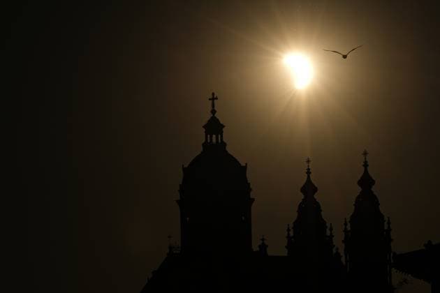 Amsterdam Watches Near-Total Solar Eclipse A partial solar eclipse is seen as the Sun sets behind the Basilica of Saint Nicholas in Amsterdam, Netherlands, on August 12, 2026. The Moon obscures about 88% of the Sun during the near-total eclipse, which is visible from across the Netherlands but falls outside the path of totality. The country last saw a near-total eclipse in 1999, while a partial eclipse was visible in 2015. The next total solar eclipse visible from the Netherlands will take place on October 7, 2135. Amsterdam Netherlands  Copyright: xGeorgiosxKostomitsopoulosx originalFilename: kostomitsopoulos-amsterda260812_npq9I.jpg