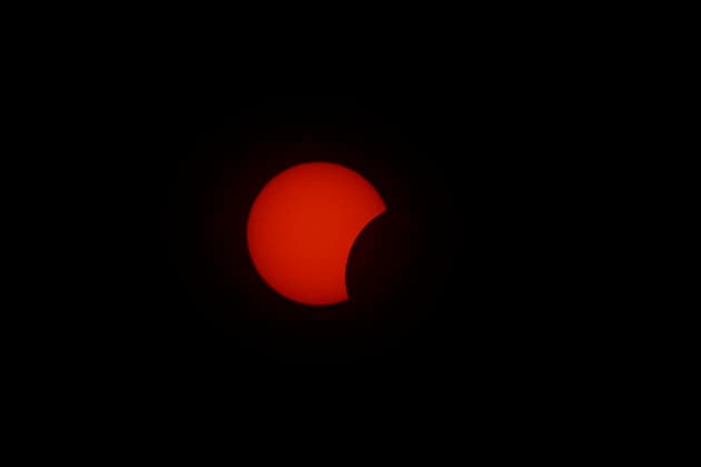 August 12, 2026, Madrid, Madrid, Spain: The distinct and breathtaking phases of a rare total solar eclipse unfold across the celestial sphere above Madrid, captured from the elevated open grounds of the Parque Forestal de Valdebebas - Felipe VI on Wednesday, August 12, 2026. Marking the first total solar eclipse visible from the Spanish mainland in 114 years, this monumental astronomical milestone traces the dramatic progression from the initial partial contact through the intermediate stages, culminating in the sublime beauty of totality. The sequence captures the razor-thin crescent of sunlight, the gradual occlusion of the solar disk by the Moon, and the ethereal, pearly-white wisps of the solar corona stretching into the darkening eveni - ZUMAo127 20260812_zep_o127_011 Copyright: xHugoxOrtunox