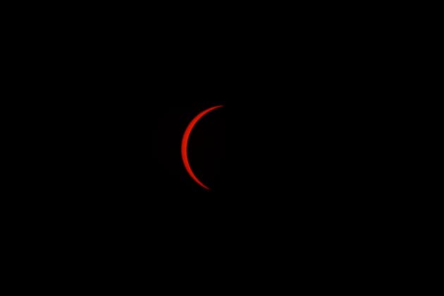 August 12, 2026, Madrid, Madrid, Spain: The distinct and breathtaking phases of a rare total solar eclipse unfold across the celestial sphere above Madrid, captured from the elevated open grounds of the Parque Forestal de Valdebebas - Felipe VI on Wednesday, August 12, 2026. Marking the first total solar eclipse visible from the Spanish mainland in 114 years, this monumental astronomical milestone traces the dramatic progression from the initial partial contact through the intermediate stages, culminating in the sublime beauty of totality. The sequence captures the razor-thin crescent of sunlight, the gradual occlusion of the solar disk by the Moon, and the ethereal, pearly-white wisps of the solar corona stretching into the darkening eveni - ZUMAo127 20260812_zep_o127_026 Copyright: xHugoxOrtunox