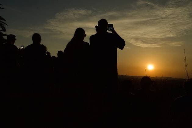 August 12, 2026, Barcelona, Spain: BARCELONA, SPAIN Ã¢â‚¬ AUGUST 12, 2026: The sky darkens over Barcelona during a total solar eclipse, briefly casting the Catalan capital in an unusual light as the astronomical event is observed across the city. Barcelona Spain - ZUMAq101 20260812_zna_q101_273 Copyright: xPabloxCarvajalxMunizagax
