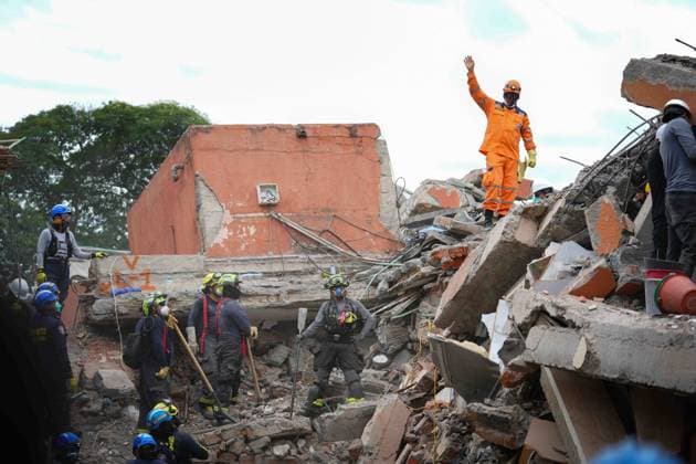 (260812) -- CALI, Aug. 12, 2026 -- Rescuers conduct search and rescue operations on the ruins of a building damaged in an earthquake in Cali, Colombia, Aug. 12, 2026. The death toll from Monday s 7.4-magnitude earthquake in western Colombia has risen to 241, with 3,771 others injured, Colombian media reported Wednesday, citing figures from the National Unit for Disaster Risk Management. (Photo by Xinhua) COLOMBIA-CALI-EARTHQUAKE-SEARCH AND RESCUE AndresxMoreno 