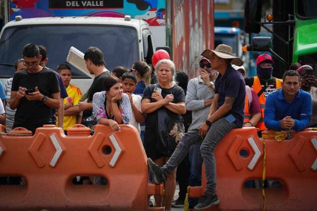 (260812) -- CALI, Aug. 12, 2026 -- People wait for news of survivors after an earthquake in Cali, Colombia, Aug. 12, 2026. The death toll from Monday s 7.4-magnitude earthquake in western Colombia has risen to 241, with 3,771 others injured, Colombian media reported Wednesday, citing figures from the National Unit for Disaster Risk Management. (Photo by Xinhua) COLOMBIA-CALI-EARTHQUAKE-SEARCH AND RESCUE AndresxMoreno 