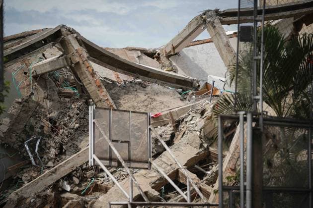 (260812) -- CALI, Aug. 12, 2026 -- This photo taken on Aug. 12, 2026 shows a collapsed building in an earthquake in Cali, Colombia. The death toll from Monday s 7.4-magnitude earthquake in western Colombia has risen to 241, with 3,771 others injured, Colombian media reported Wednesday, citing figures from the National Unit for Disaster Risk Management. (Photo by Xinhua) COLOMBIA-CALI-EARTHQUAKE-AFTERMATH AndresxMoreno 