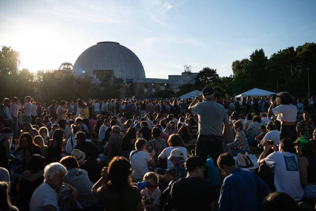 (260812) -- BERLIN, Aug. 12, 2026 -- People observe the partial solar eclipse at the Zeiss Grand Planetarium in Berlin, Germany, Aug. 12, 2026. The Long Night of Astronomy event was held here on Wednesday, inviting the public to observe the solar eclipse and experience the fascination of astronomy. ) GERMANY-BERLIN-SOLAR ECLIPSE ZhangxHaofu 