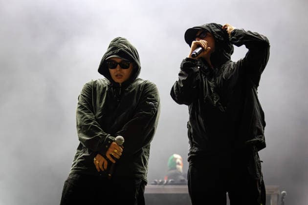 Kneecap seen performing live on Vodafone Stage during Vodafone Paredes de Coura in Paredes de Coura, Portugal - 13 AUG 2026. Mo Chara and MÛglaÌ Bap of the Irish hip?hop trio, Kneecap seen performing together on the Vodafone Stage during Vodafone Paredes de Coura. Paredes de Coura Portugal Copyright: xDiogoxBaptistax xSOPAxImagesx DB_Kneecap20260812PDC_021