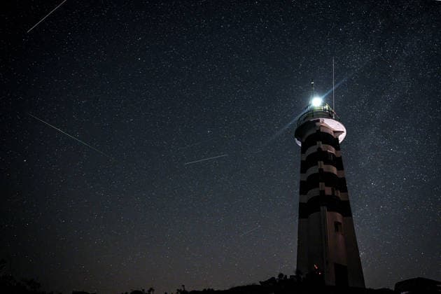 Meteor shower observed in Izmir IZMIR, TURKIYE - AUGUST 12: Meteors streak across the night sky during the annual Perseid meteor shower over the Sarpincik Lighthouse in the Karaburun district of Izmir, Turkiye, on August 12, 2026. Mahmut Serdar Alakus Anadolu Izmir Turkey. Editorial use only. Please get in touch for any other usage.  Copyright: x2026xAnadoluxMahmutxSerdarxAlakusx