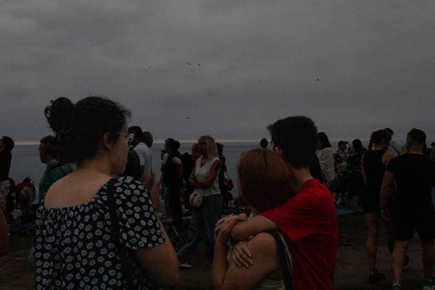 Solar eclipse in Gijon, Spain GIJON, SPAIN - AUGUST 12 : People gather to watch the total solar eclipse in Gijon, Spain on August 12, 2026. Nico Rodriguez Anadolu Gijon Spain. Editorial use only. Please get in touch for any other usage.  Copyright: x2026xAnadoluxNicoxRodriguezx