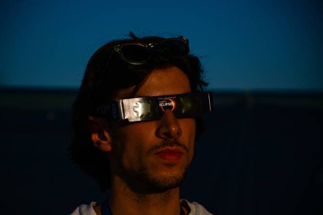 Solar Eclipse Seen Through Protective Glasses - Paris Photography of the solar eclipse through glasses as the moon fully passes over the sun s horizon during a partial solar eclipse in Paris on August 12, 2026. Photo by Tomas Stevens ABACAPRESS.COM Paris Ile-de-France France  Copyright: xStevensxTomas ABACAx