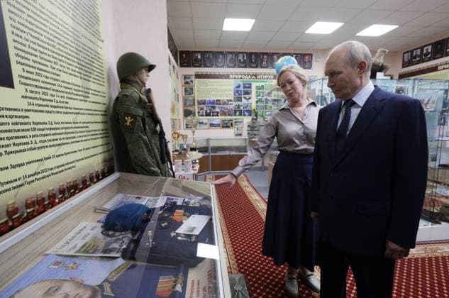Russia Putin Far Eastern Federal District 9221355 13.08.2026 Russian President Vladimir Putin, accompanied by Sakhalin Region Education Minister Anastasia Kikteva, visits the secondary school named after Hero of Russia Eduard Norpolov in Kurilsk, Sakhalin region, Russia. Gavriil Grigorov Sputnik Kurilsk Sakhalin Region Russia  Copyright: xGavriilxGrigorovx