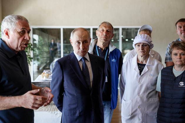 RUSSIA, SAKHALIN REGION - AUGUST 13, 2026: Alexander Verkhovsky, President of Gidrostroy, accompanies Vladimir Putin (L-R), President of Russia, on his visit to the Yasny Clear fish processing plant owned by Gidrostroy and situated on Iturup Island. Gavriil Grigorov Russian Presidential Press and Information Office TASS  96092647