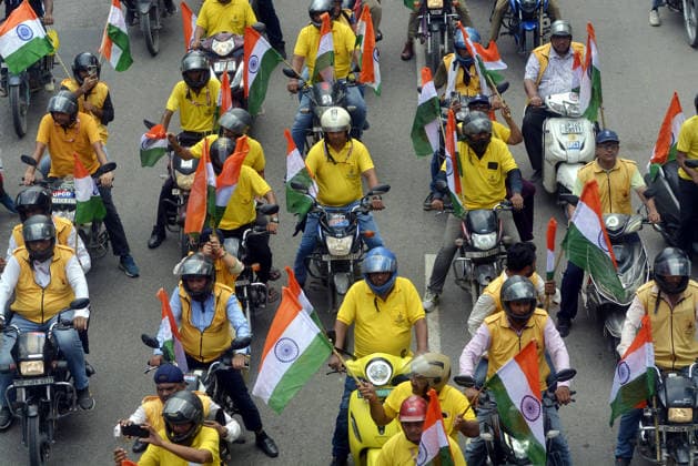 RECORD DATE NOT STATED GHAZIABAD, INDIA - AUGUST 13: Uttar Pradesh Police personnel and Civil Defence volunteers participate in a Tiranga bike rally organised by the district administration along with Civil Defence and Uttar Pradesh Police as part of the nationwide Har Ghar Tiranga campaign ahead of 80th Independence Day on August 13, 2026 in Ghaziabad, India. (Photo by Sakib Ali Hindustan Times) Ghaziabad Police Personnel Take Out Tiranga Bike Rally Ahead Of Independence Day