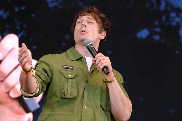 August 13, 2026, Williamscot, Oxfordshire, United Kingdom: British stand up comedian and compere Matt Bragg performs live on stage at Fairport s Cropredy Convention. Matt Bragg is the son of television warm up act Bobby Bragg, He has supported comedians Ricky Gervais, Harry Hill, Lloyd Griffith, Jason Manford and John Bishop. He was runner up in Leicester Mercury™s Comedian of The Year 2020. He is based in the midlands. Williamscot United Kingdom - ZUMAs197 20260813_aaa_s197_197 Copyright: xDawnxFletcher-Parkx