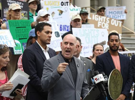 August 13, 2026, New York, New York, USA: NYC Council member HARVEY EPSTEIN and supporters of the NYC Bird Alliance gather outside City Hall to demand the passage of Lights Out legislation. The bill, dubbed Flaco s Law, aims to curb commercial night lighting to protect over 250,000 migratory birds from fatal building collisions in New York City annually. New York USA - ZUMAk03_ 20260813_zaf_k03_022 Copyright: xNancyxKaszermanx