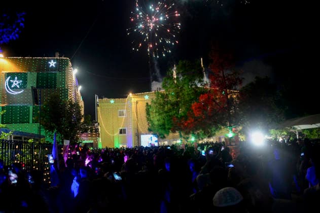 Pakistan Independence Day Celebrations Rawalpindi A crowd watches fireworks above illuminated buildings during Independence Day celebrations in Rawalpindi, Pakistan, on August 14, 2026. Pakistan marks Independence Day on August 14, commemorating the countryis independence from British rule in 1947. Rawalpindi Punjab Pakistan Copyright: xZubairxAbbasix