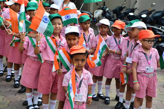 August 14, 2026, Siliguri, West Bengal, India: School children from Bright Academy preparatory school, along with their teachers and staff, wave Indian National flags while taking part in the Tiranga Yatra in Siliguri, on the eve of India s Independence Day celebrations. Siliguri India - ZUMAd209 20260814_znp_d209_002 Copyright: xDiptenduxDuttax