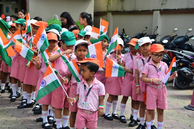 August 14, 2026, Siliguri, West Bengal, India: School children from Bright Academy preparatory school, along with their teachers and staff, wave Indian National flags while taking part in the Tiranga Yatra in Siliguri, on the eve of India s Independence Day celebrations. Siliguri India - ZUMAd209 20260814_znp_d209_006 Copyright: xDiptenduxDuttax